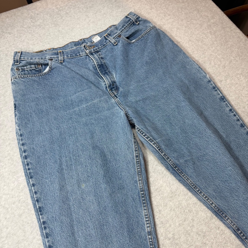 Vintage Levis 550 Relaxed Fit Tapered Leg Light Wash Jeans Made in USA 20 Short
